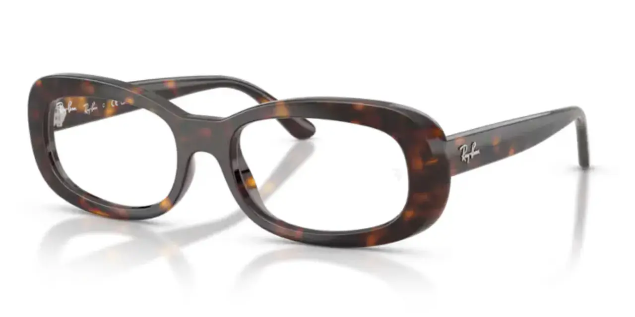 Okulary Ray-Ban w panterkę z uszkodzonym antyrefleksem na soczewce.